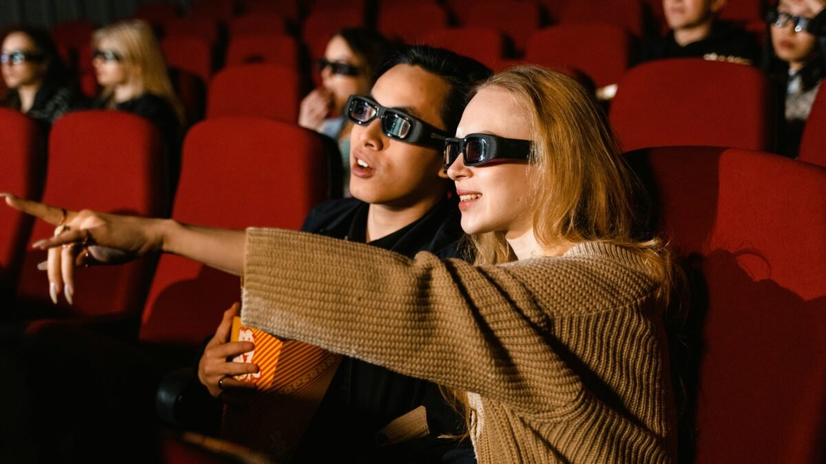 Cinema audience in a dark movie theater
